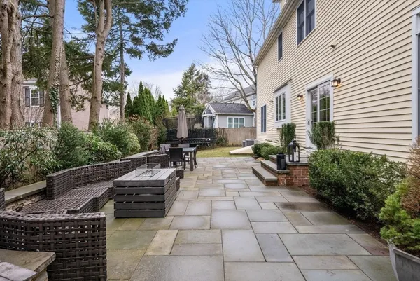 a view of backyard with sitting area and garden