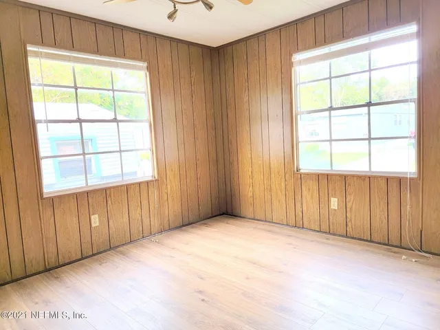 an empty room with windows