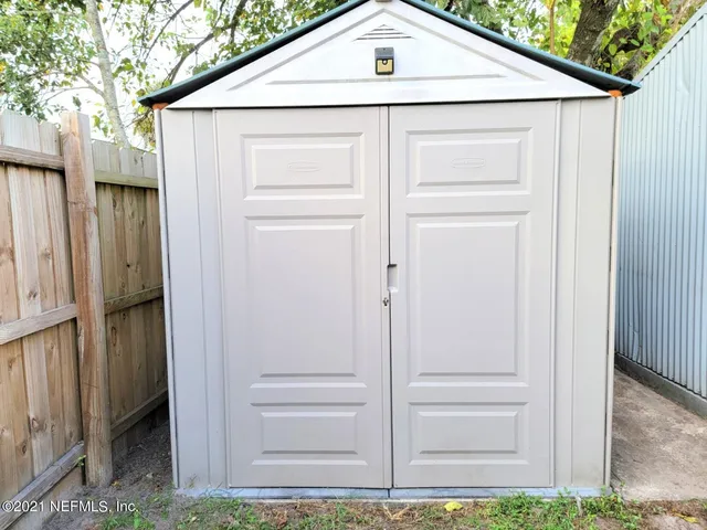a view of a house with a wooden door