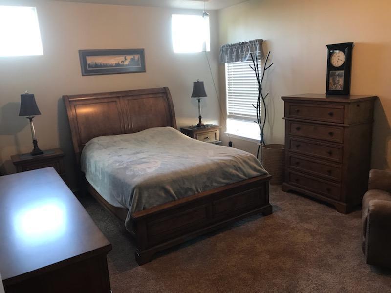 32158 Modoc Point Road Chiloquin, OR 97624 - Photo 9 of 37 a bedroom with a bed and window