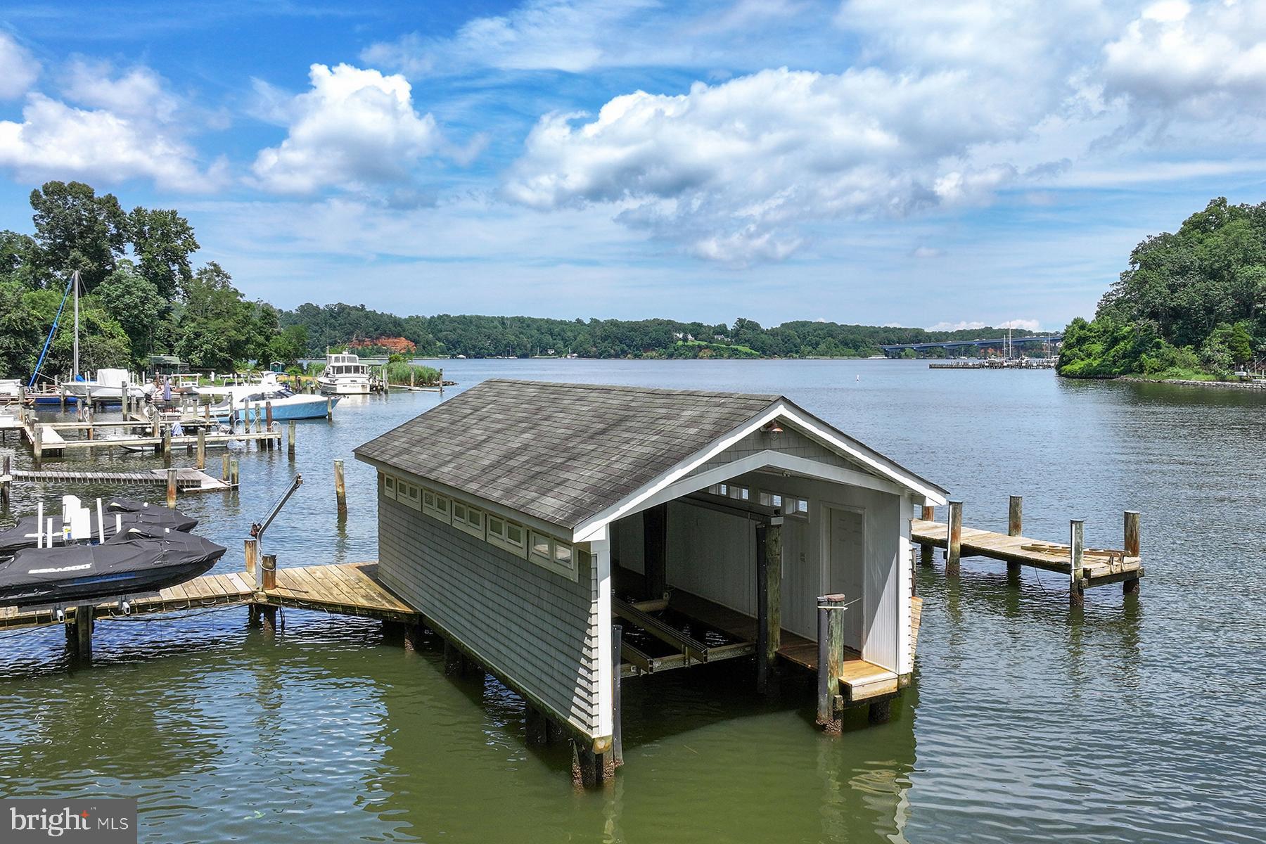 1715 Porters Hill Road Annapolis, MD 21401 - Photo 7 of 52 Large boathouse with boat lift inside