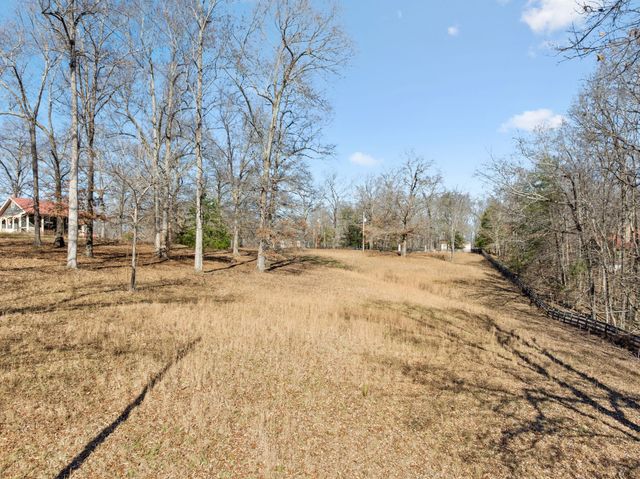 a view of yard covered with snow