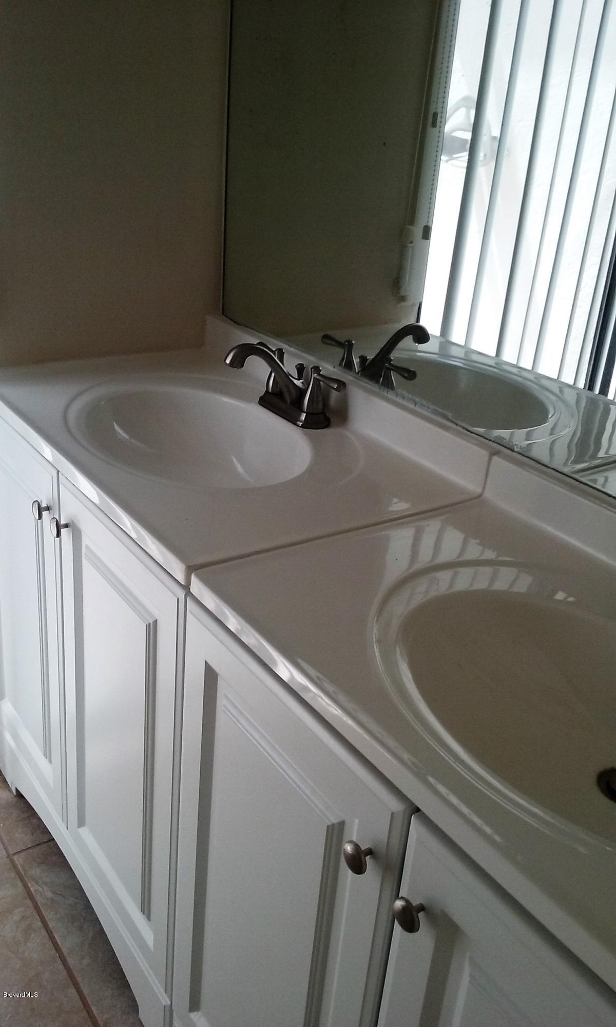 366 Myrtlewood Road Melbourne, FL 32940 - Photo 16 of 43 a close view of sink