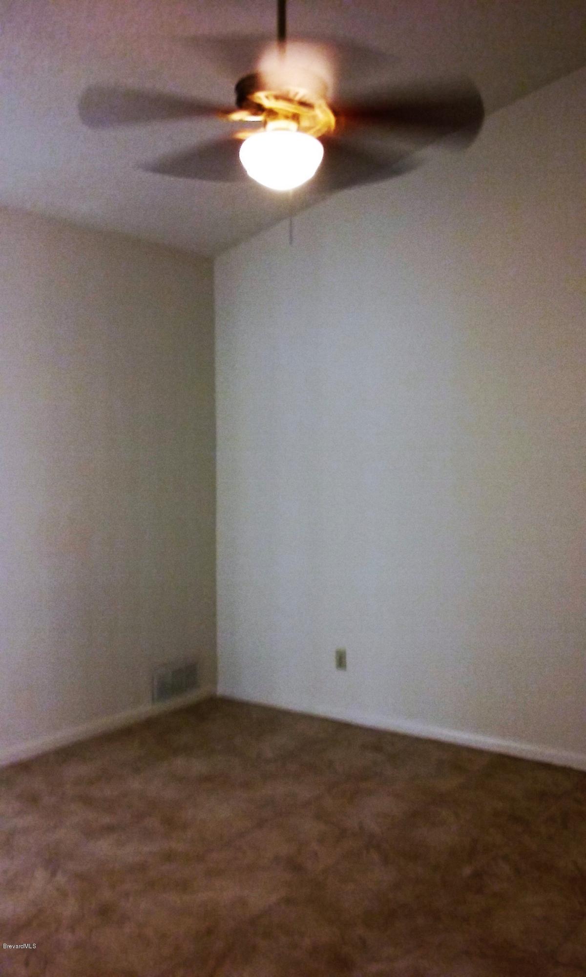 366 Myrtlewood Road Melbourne, FL 32940 - Photo 20 of 43 a view of an empty room