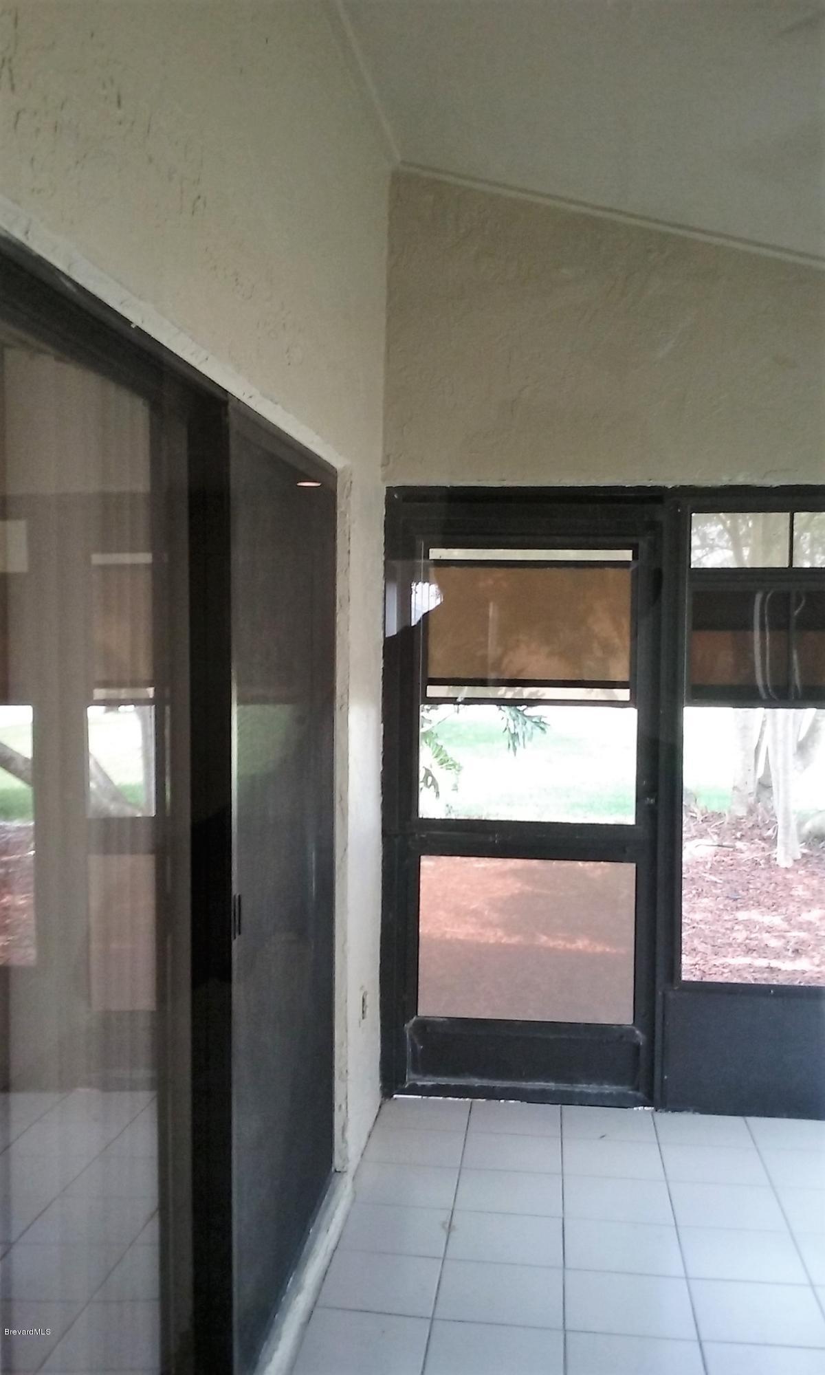 366 Myrtlewood Road Melbourne, FL 32940 - Photo 22 of 43 a view of open kitchen with a window