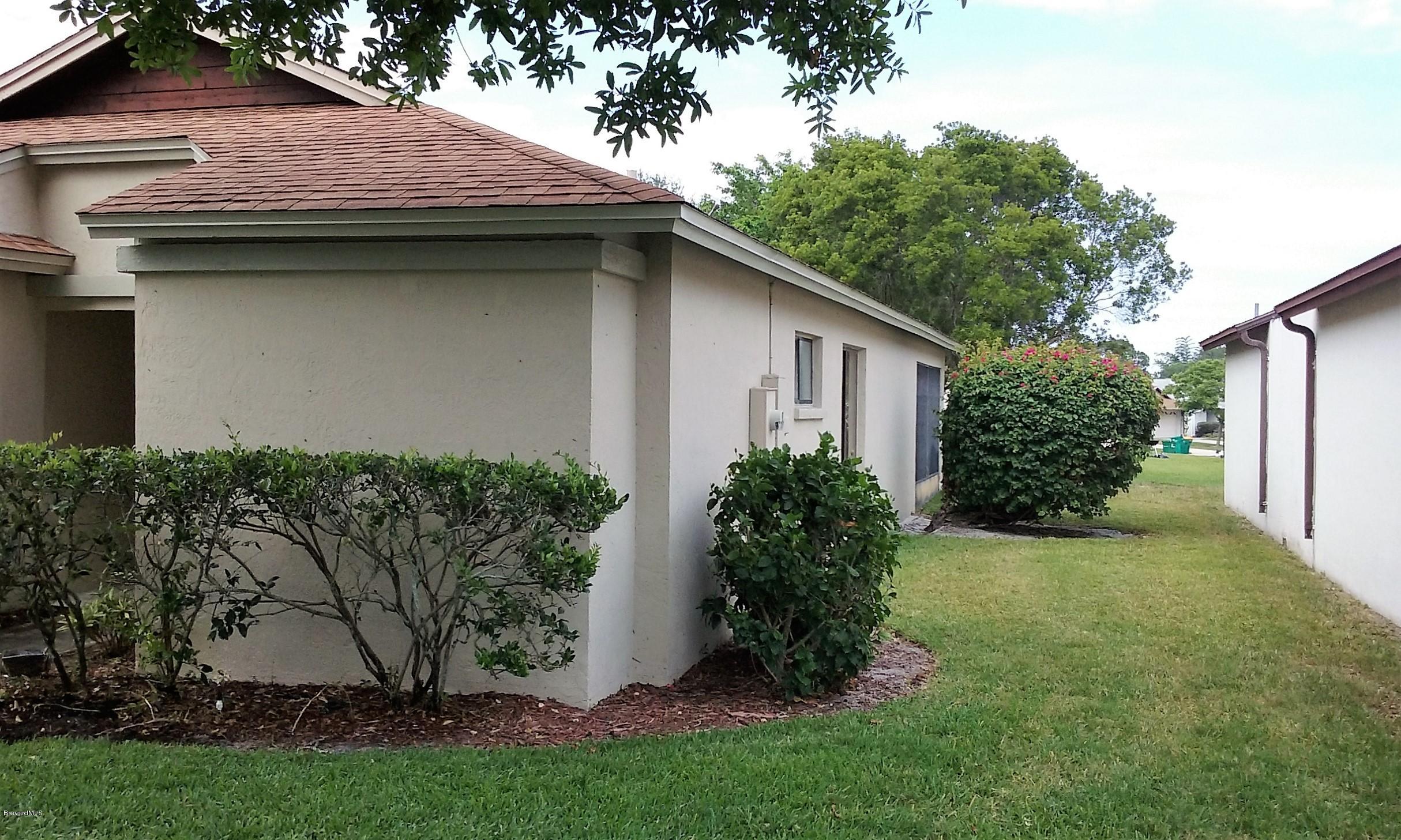 366 Myrtlewood Road Melbourne, FL 32940 - Photo 5 of 43 a view of a house with a yard and plants
