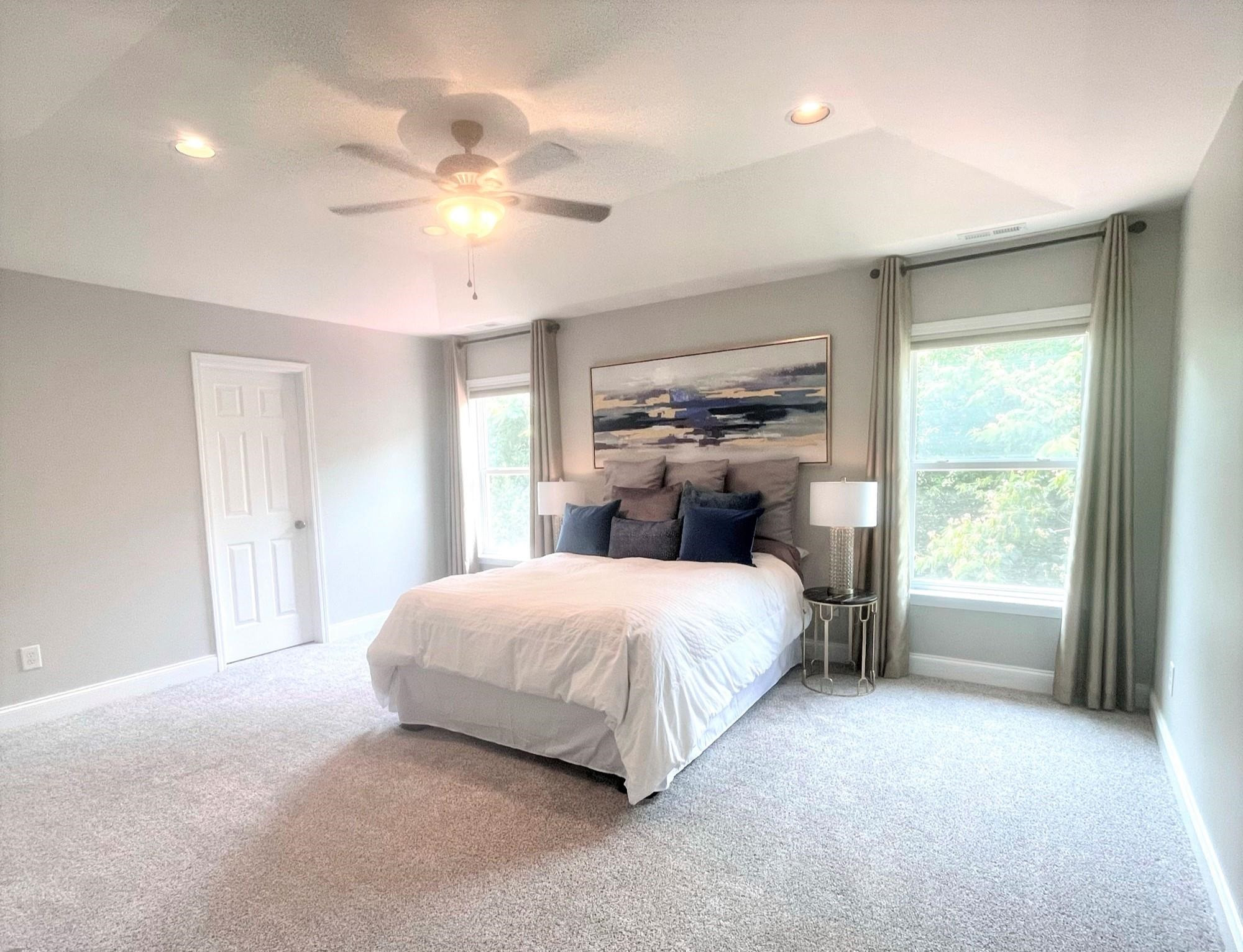 503 Emerald Downs Road Cary, NC 27519 - Photo 20 of 30 Primary Bedroom Overlooks Natural Pond