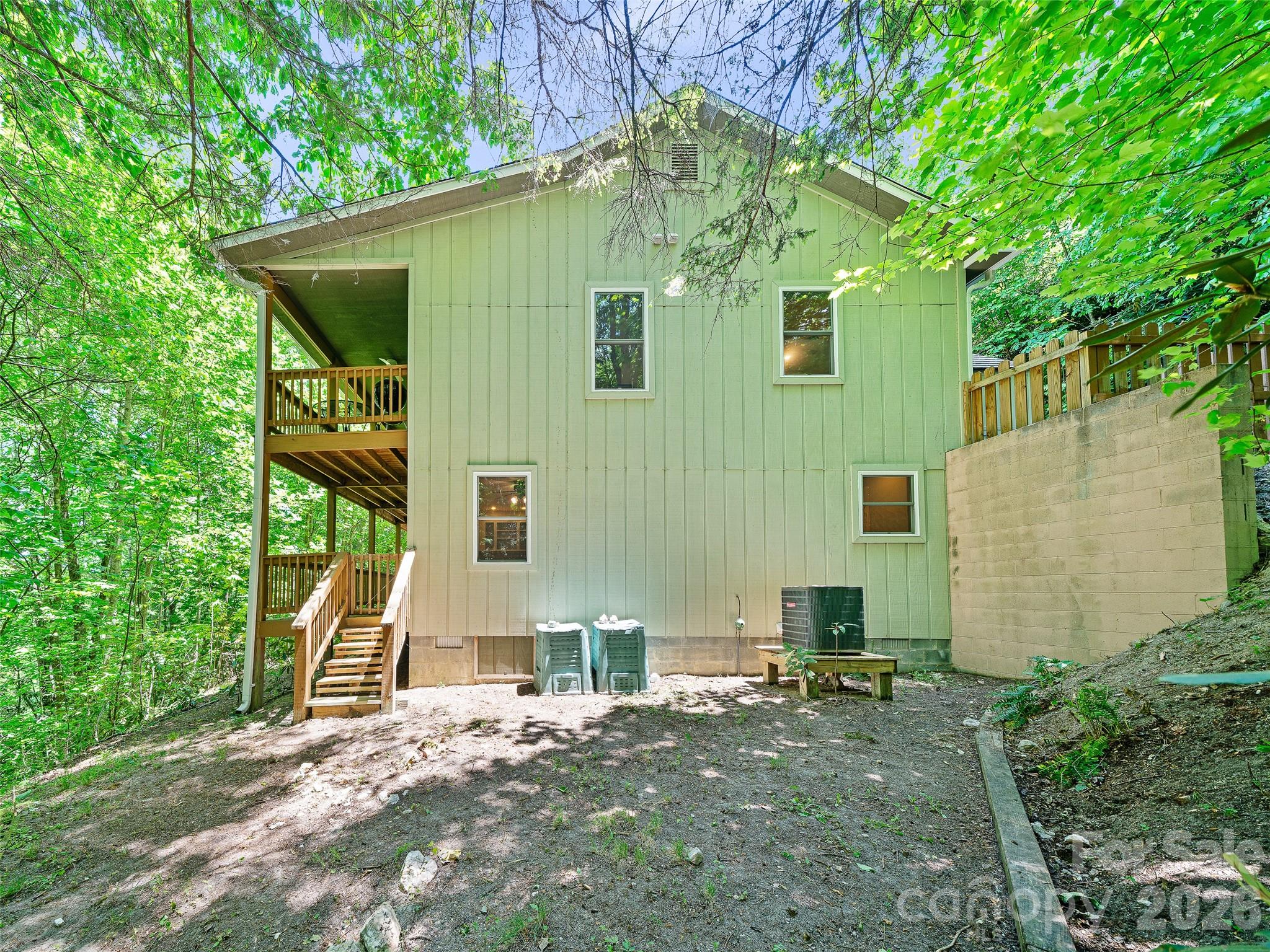 142 Wildflower Road Spruce Pine, NC 28777 - Photo 37 of 46 a front view of a house with a yard