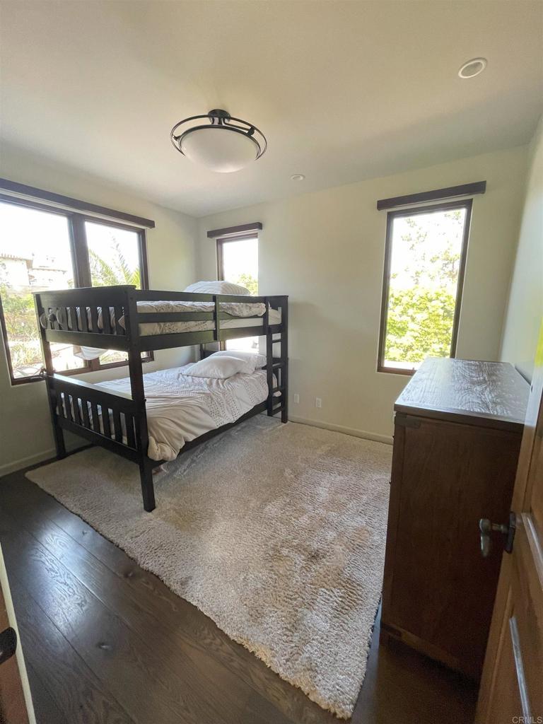 7029 Las Colinas Rancho Santa Fe, CA 92067 - Photo 5 of 10 a bedroom with furniture and window