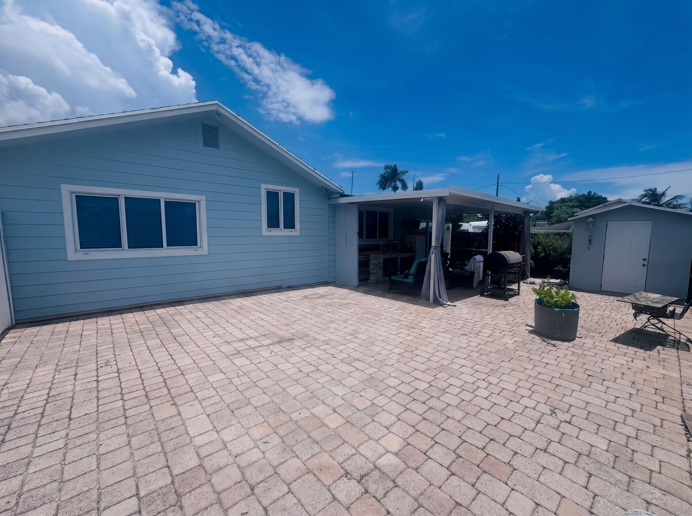 3718 Coconut Road, Unit A Palm Springs, FL 33461 - Photo 18 of 19 Patio 4