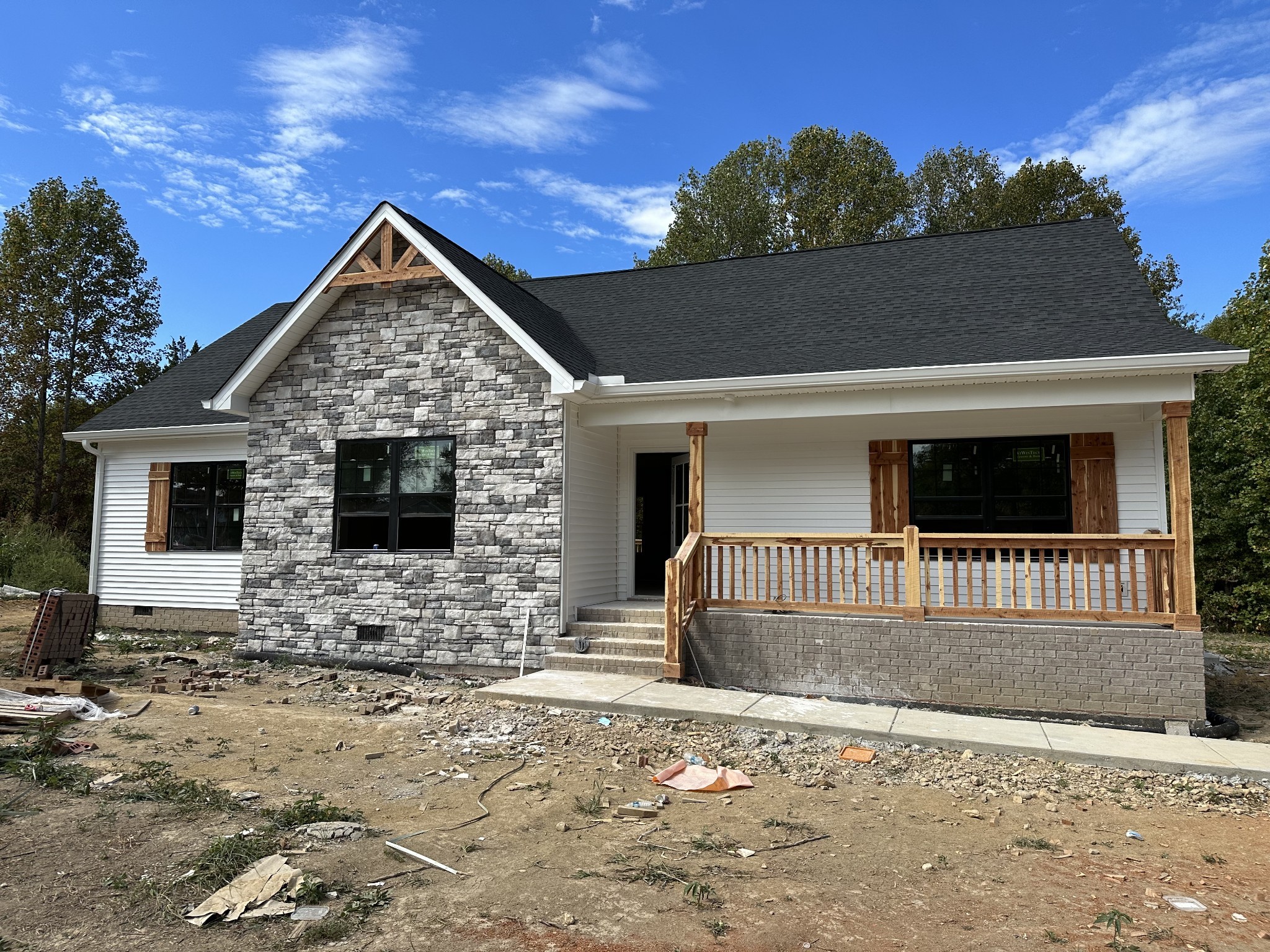 989 Mt Vernon Road Bethpage, TN 37022 - Photo 1 of 9 a front view of a house with a yard
