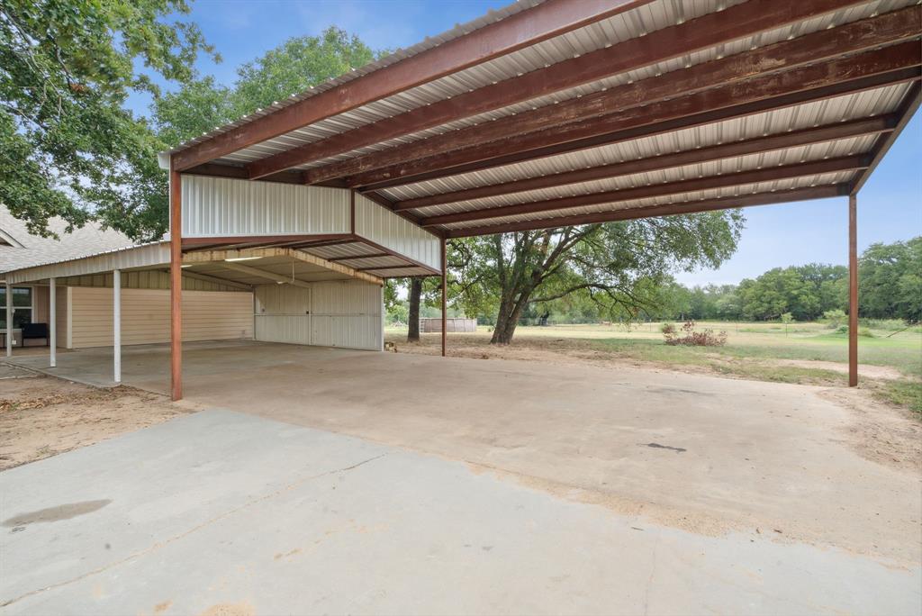 298 Townson Road Dublin, TX 76446 - Photo 12 of 40 a view of a house with a big yard