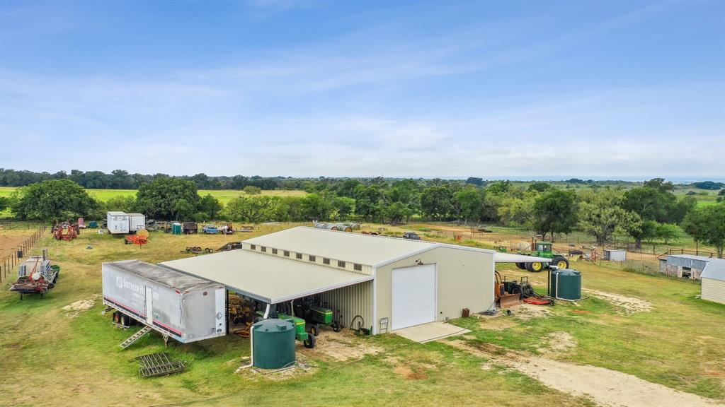 298 Townson Road Dublin, TX 76446 - Photo 21 of 40 a view of a swimming pool and lounge chairs in patio