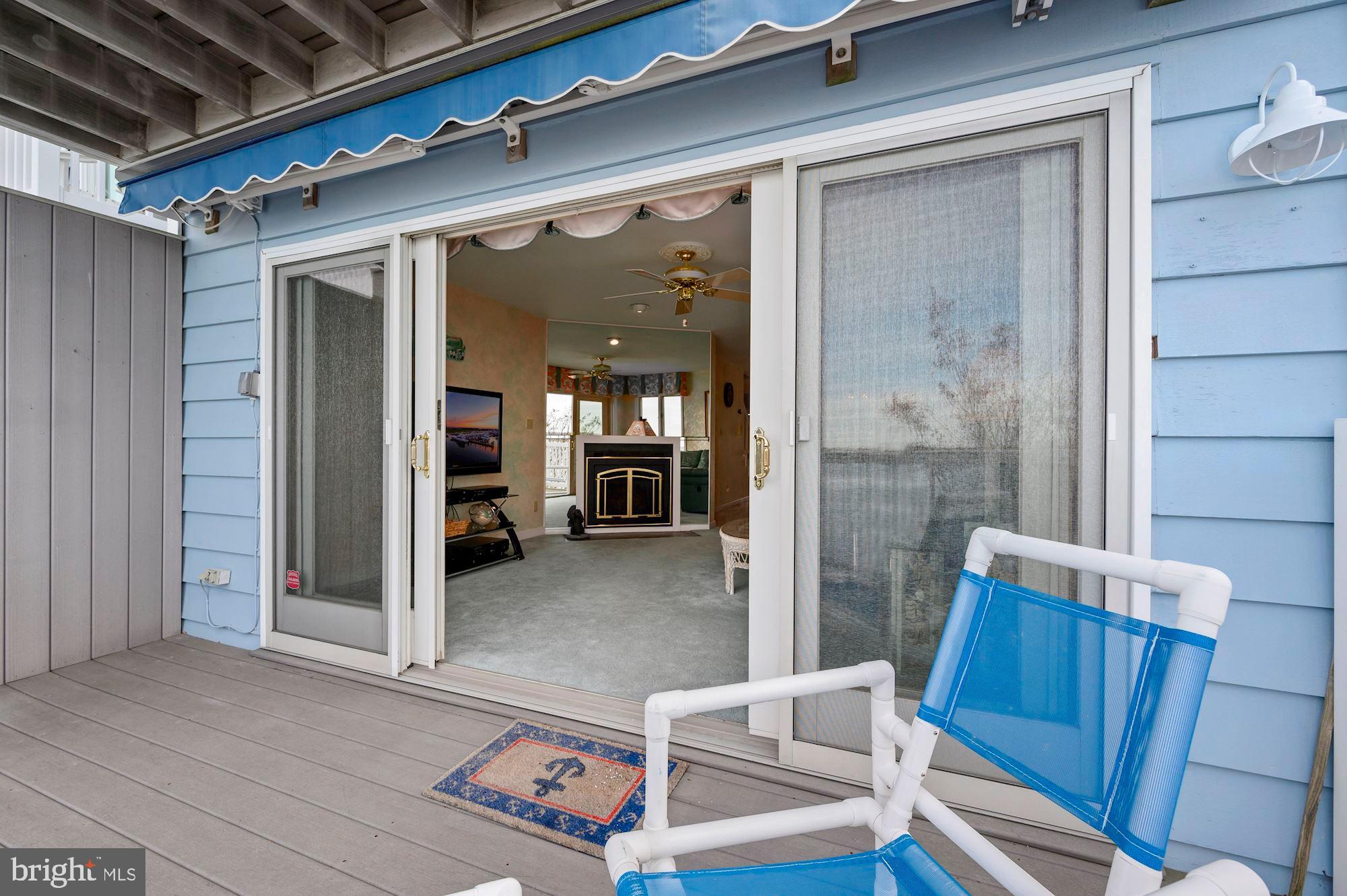724 South Surf Road, Unit 1 Ocean City, MD 21842 - Photo 7 of 30 Waterside Deck and Family Room Slider