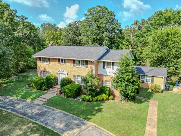 a view of balcony with small garden