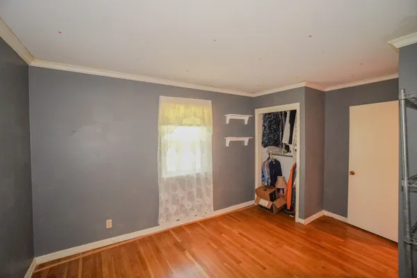 an aerial view of a house with yard