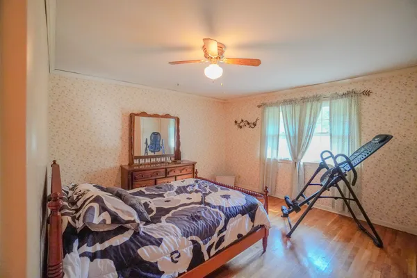 a aerial view of a house with a yard