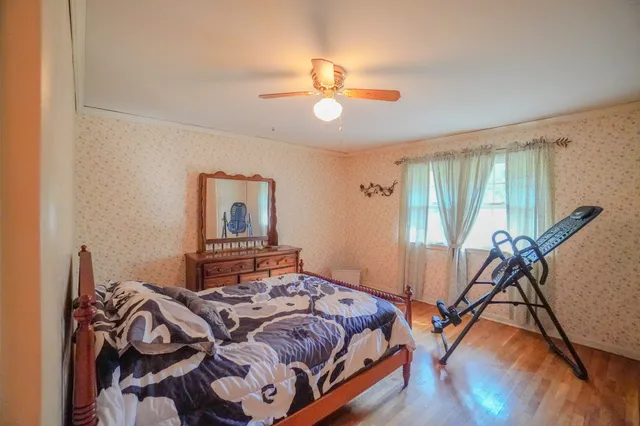 a aerial view of a house with a yard