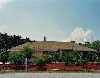 1051 Mangrove Road Venice, FL 34293 - Photo 1 of 1 a view of a house with a garden