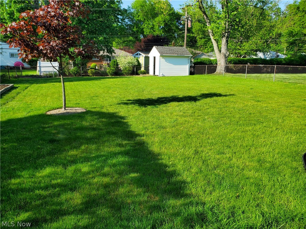 1249 Blanchester Road Lyndhurst, OH 44124 - Photo 22 of 22 fenced-in backyard w/ vegetable garden box and shed