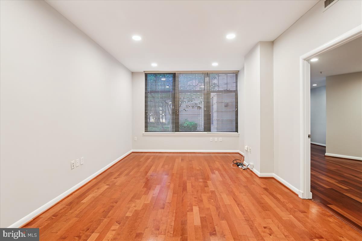 1021 North Garfield Street, Unit 117 Arlington, VA 22201 - Photo 17 of 30 Living room with courtyard view