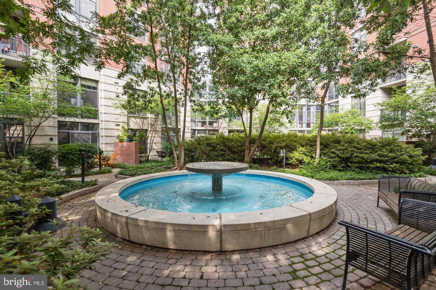 1021 North Garfield Street, Unit 117 Arlington, VA 22201 - Photo 27 of 30 Tranquil courtyard fountain