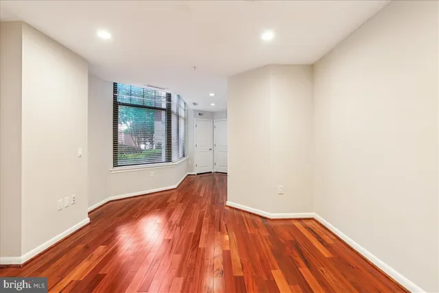 a view of a room that has a window in it