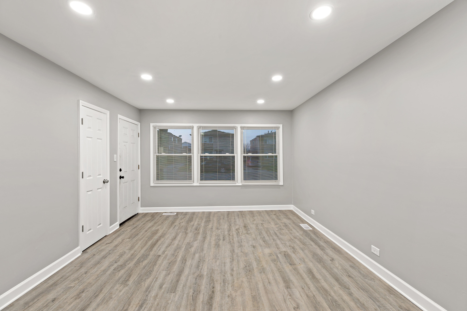 432 West Hickory Street Chicago Heights, IL 60411 - Photo 13 of 23 a view of wooden floor and windows in a room