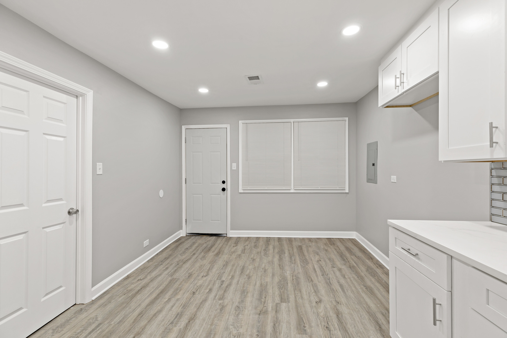 432 West Hickory Street Chicago Heights, IL 60411 - Photo 15 of 23 a view of a room with wooden floors and led lights