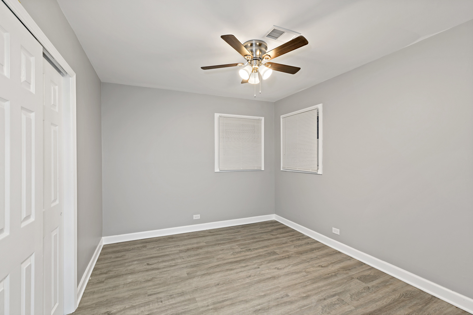 432 West Hickory Street Chicago Heights, IL 60411 - Photo 16 of 23 a view of a room with wooden floor and closet