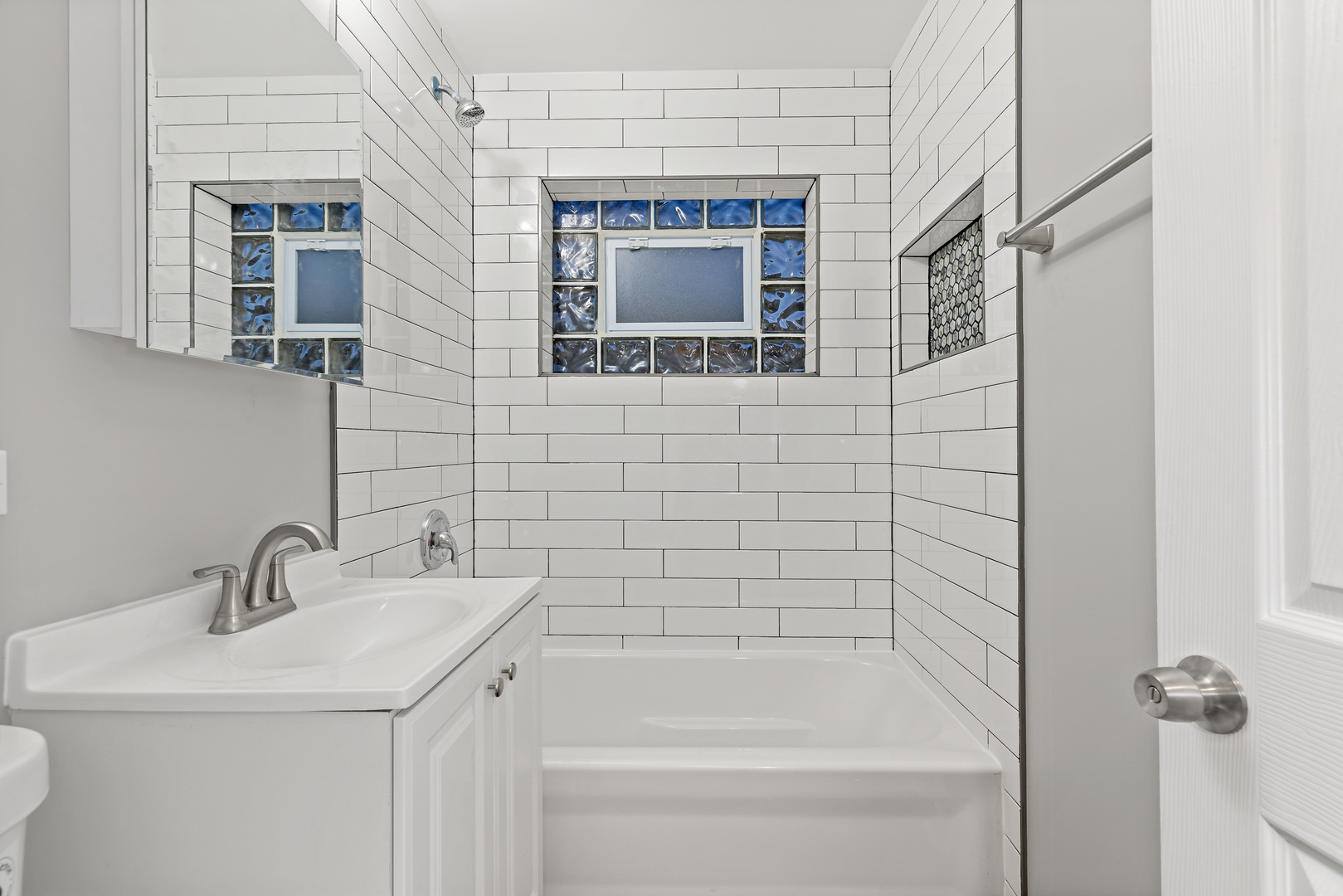 432 West Hickory Street Chicago Heights, IL 60411 - Photo 18 of 23 a bathroom with a sink and a shower