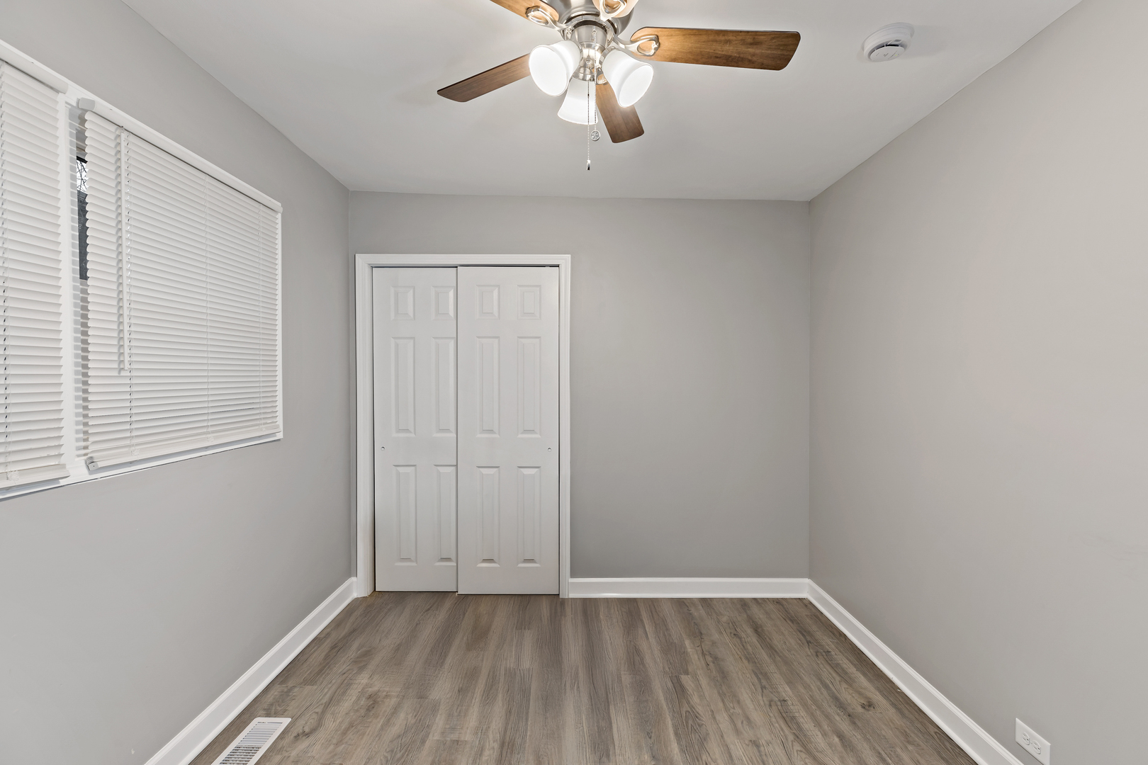 432 West Hickory Street Chicago Heights, IL 60411 - Photo 20 of 23 wooden floor in an empty room with a window