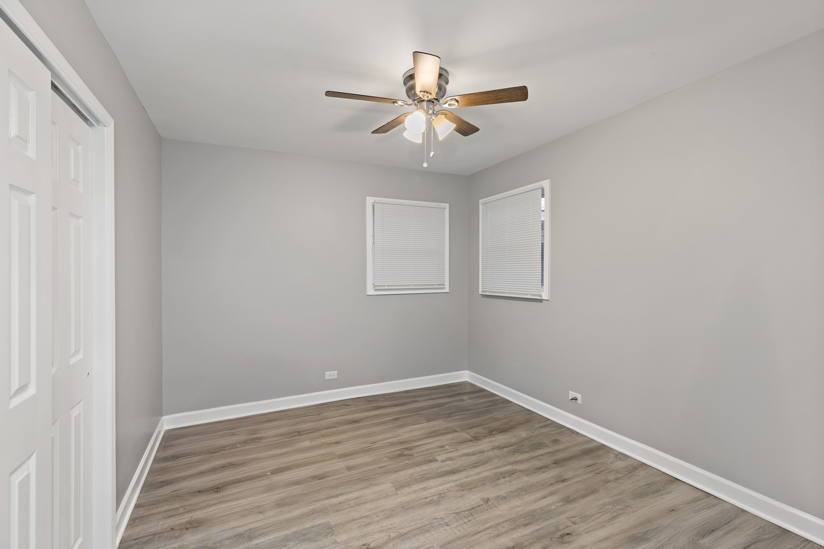 432 West Hickory Street Chicago Heights, IL 60411 - Photo 21 of 23 a view of an empty room with wooden floor