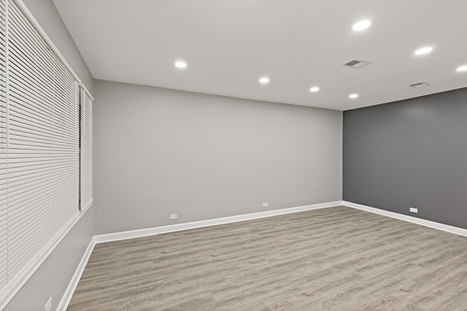 432 West Hickory Street Chicago Heights, IL 60411 - Photo 4 of 23 wooden floor in an empty room with a window