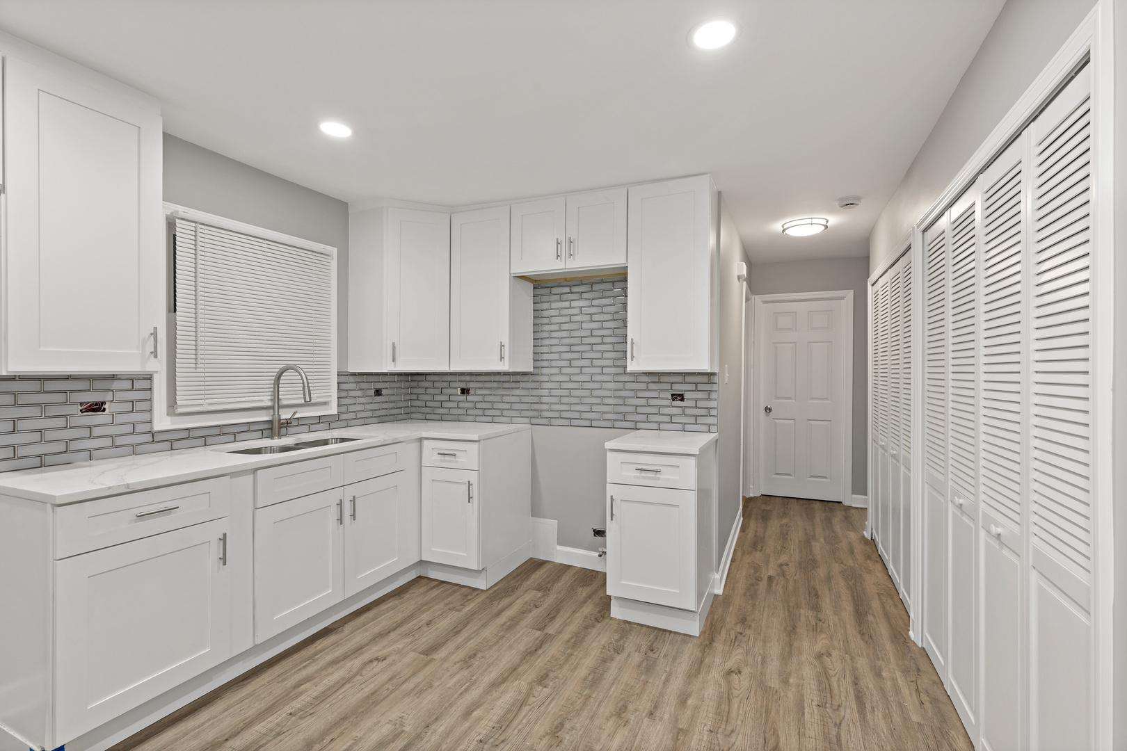432 West Hickory Street Chicago Heights, IL 60411 - Photo 8 of 23 a spacious bathroom with a granite countertop sink mirror and a toilet