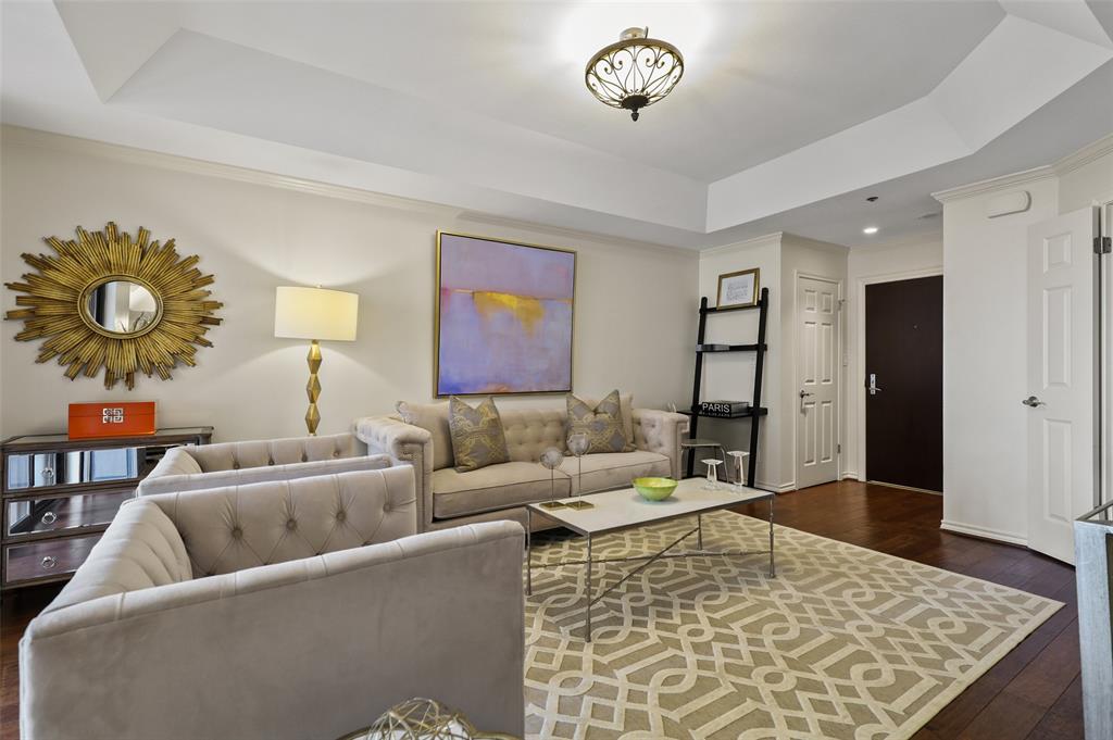 5909 Luther Lane, Unit 1102 Dallas, TX 75225 - Photo 2 of 31 a living room with furniture and a couch