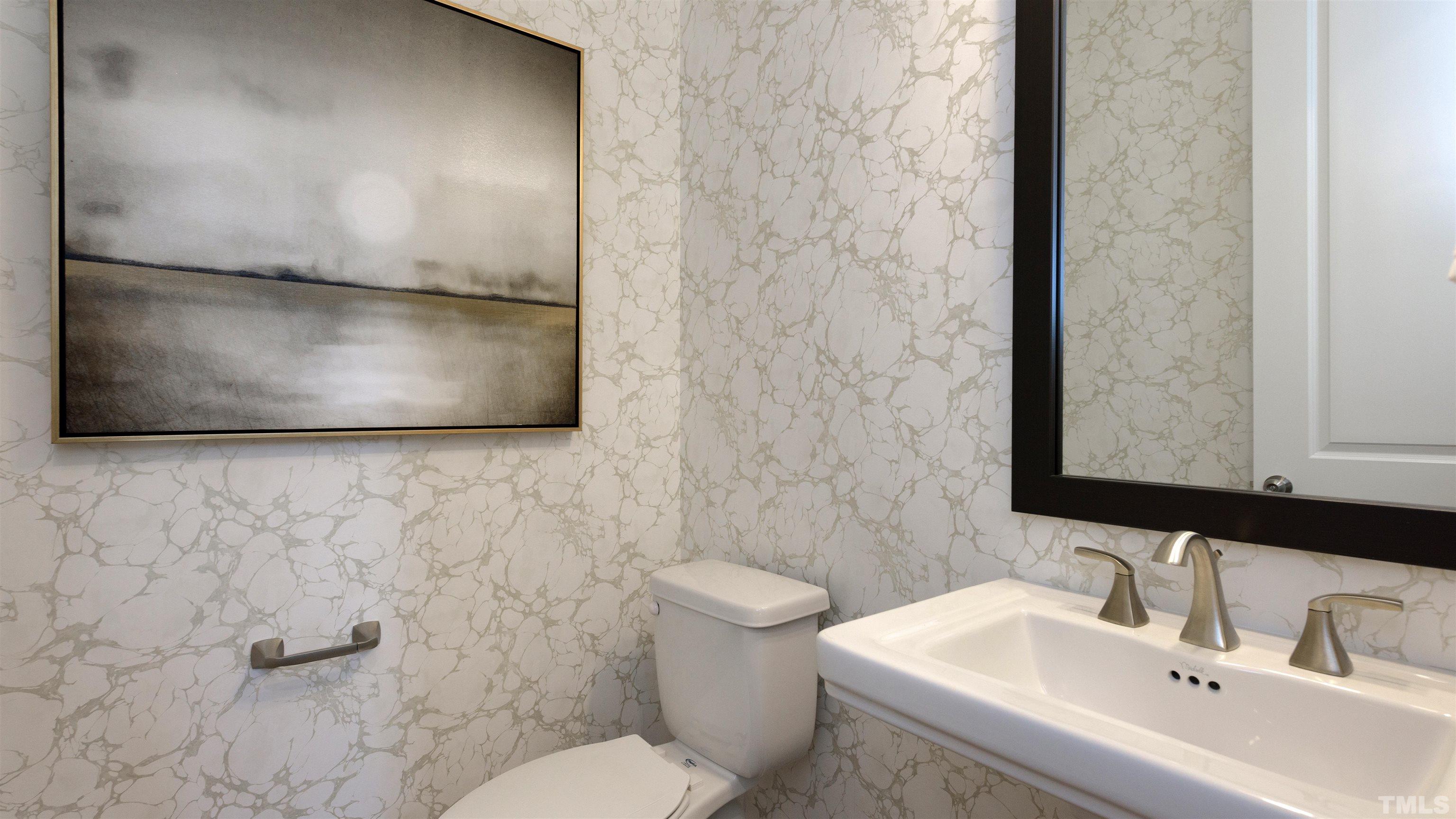 3245 Lynn Road, Unit 20 Raleigh, NC 27613 - Photo 23 of 26 a bathroom with a sink and a mirror