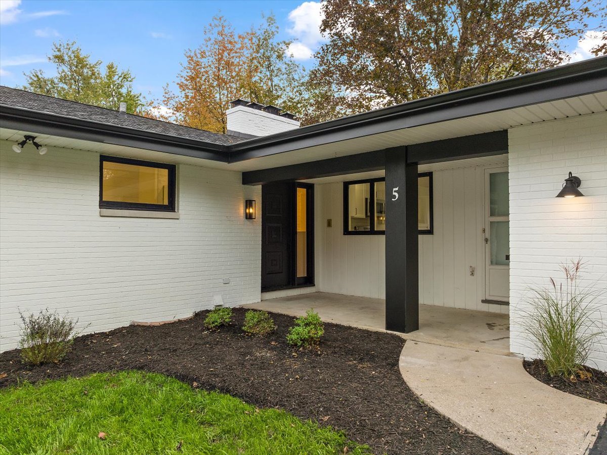 a view of a front door and porch