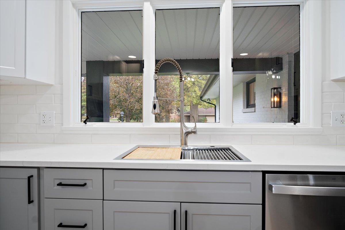 5 Ridgemont Road Normal, IL 61761 - Photo 20 of 58 a kitchen with a sink and a window