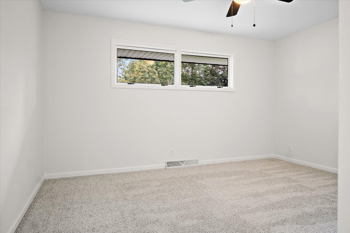 5 Ridgemont Road Normal, IL 61761 - Photo 32 of 58 an empty room with a window