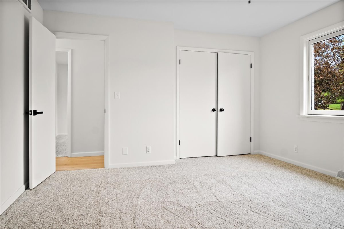 5 Ridgemont Road Normal, IL 61761 - Photo 34 of 58 a view of an empty room with a window