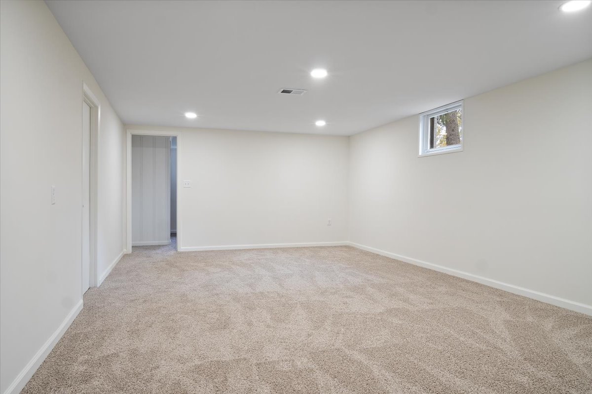 5 Ridgemont Road Normal, IL 61761 - Photo 41 of 58 an empty room with windows