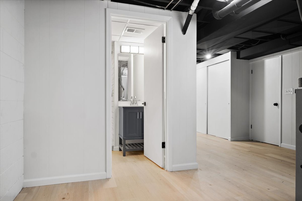 5 Ridgemont Road Normal, IL 61761 - Photo 43 of 58 a view of a hallway with wooden cabinets