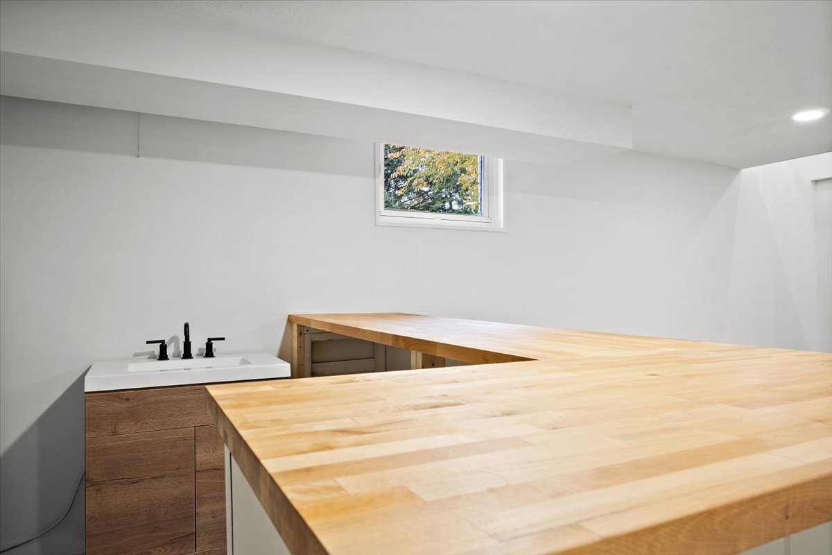 5 Ridgemont Road Normal, IL 61761 - Photo 46 of 58 a bedroom with a bed and a painting on the wall