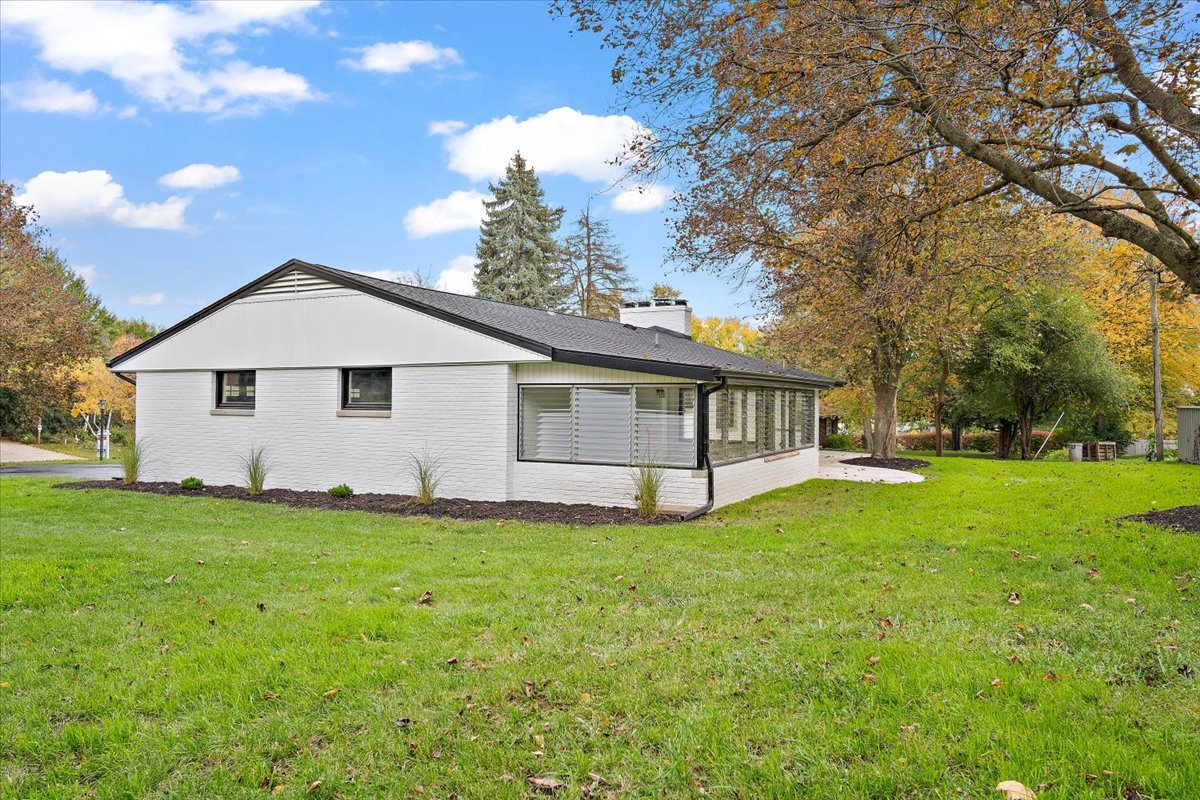 5 Ridgemont Road Normal, IL 61761 - Photo 47 of 58 a white house that has a big yard plants and large trees