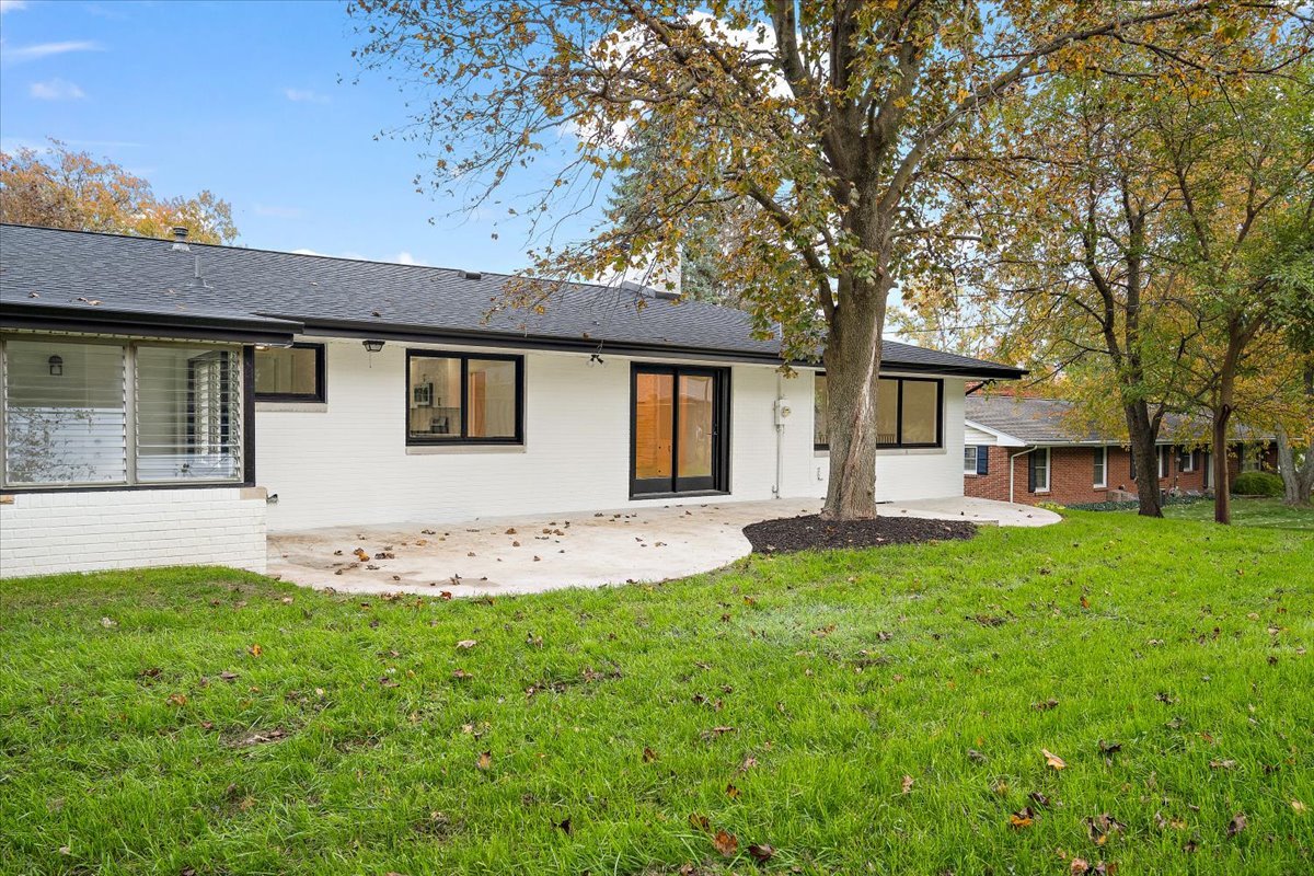 5 Ridgemont Road Normal, IL 61761 - Photo 48 of 58 a front view of a house with a yard and trees