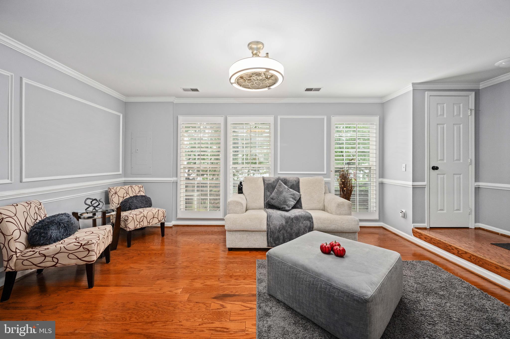 9332 Wax Myrtle Way Manassas, VA 20110 - Photo 19 of 50 a living room with furniture and a large window
