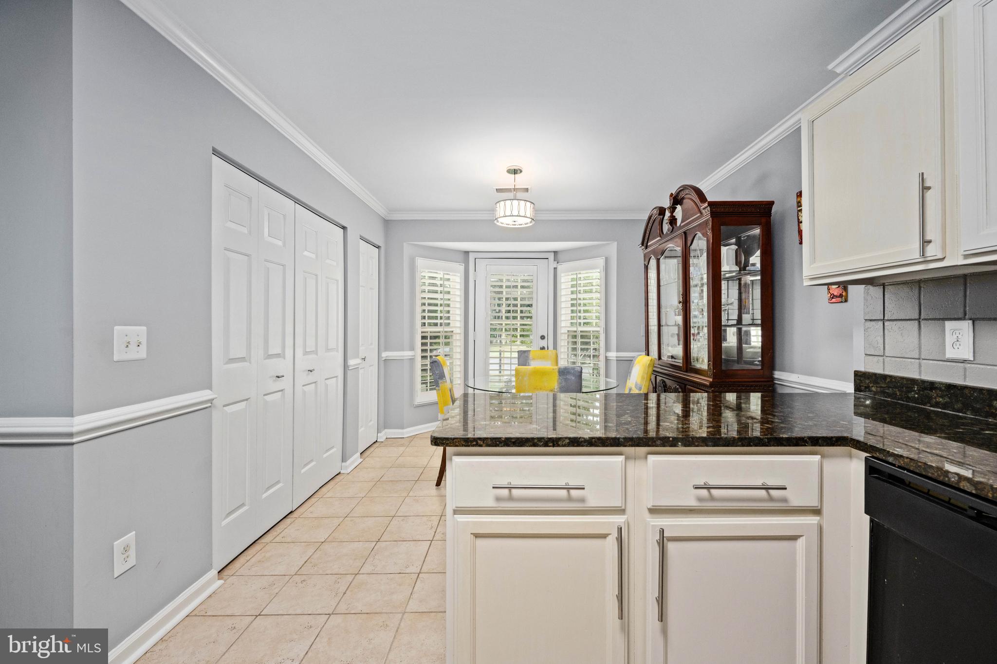9332 Wax Myrtle Way Manassas, VA 20110 - Photo 26 of 50 a kitchen with stainless steel appliances granite countertop a refrigerator and a stove top oven