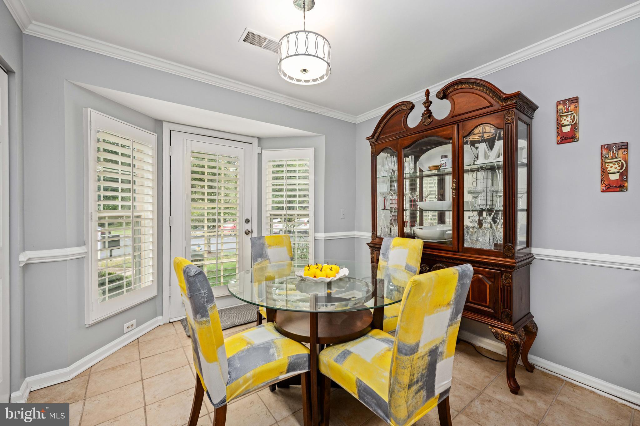 9332 Wax Myrtle Way Manassas, VA 20110 - Photo 27 of 50 a view of a dining room with furniture window and outside view