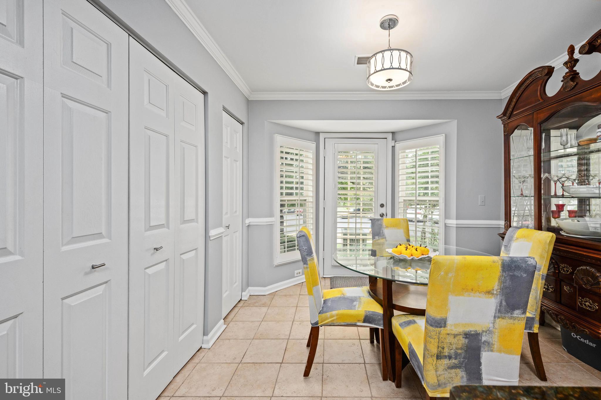 9332 Wax Myrtle Way Manassas, VA 20110 - Photo 28 of 50 a view of a dining room with furniture window and outside view